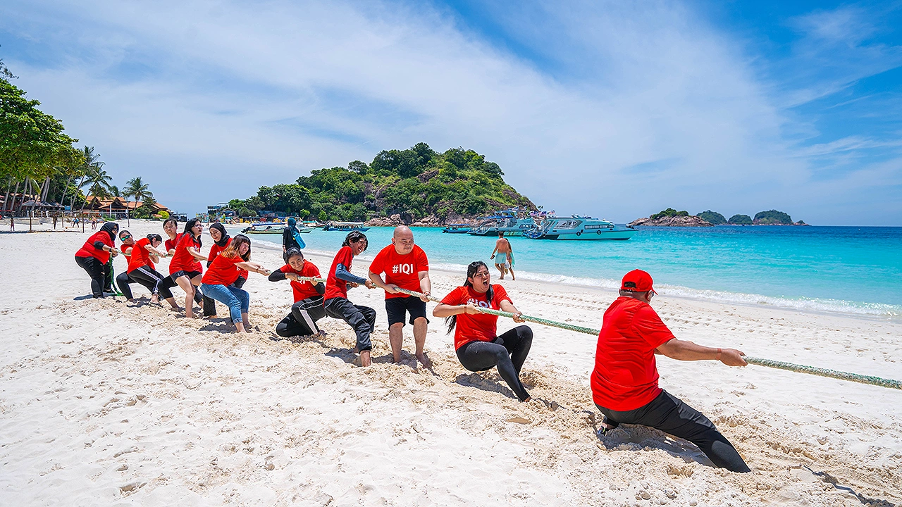 IQI team members collaborating during a team-building event