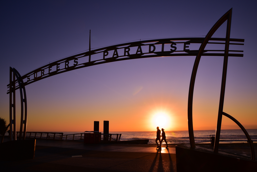 a couple enjoying a walk down surfers paradise