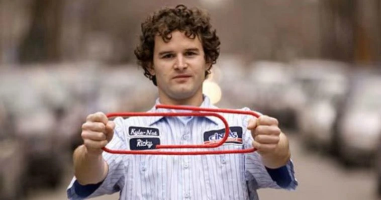 Kyle Macdonald holding a paperclip