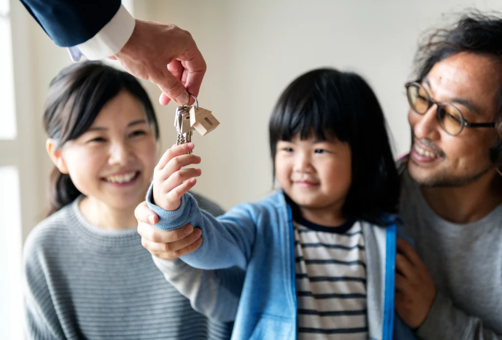 Family getting the key for their house