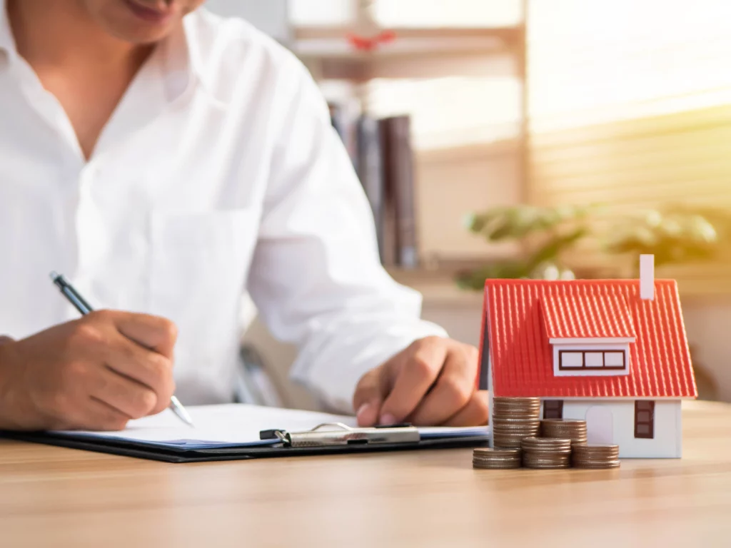 Real estate agent reviewing the property